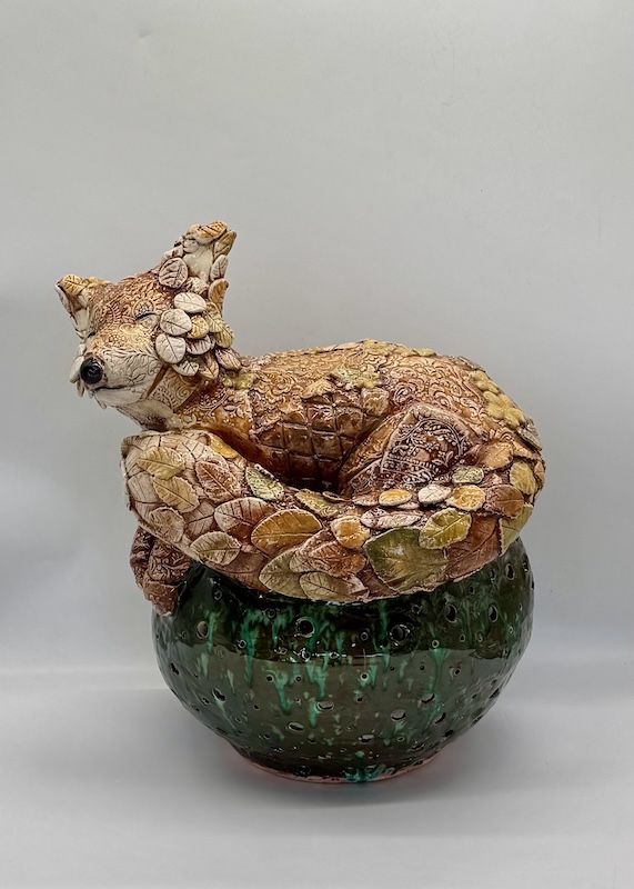 Jar topped with whimsical fox