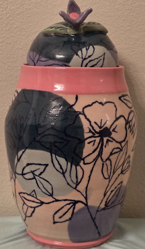 Jar With Pink accents and Flower motif