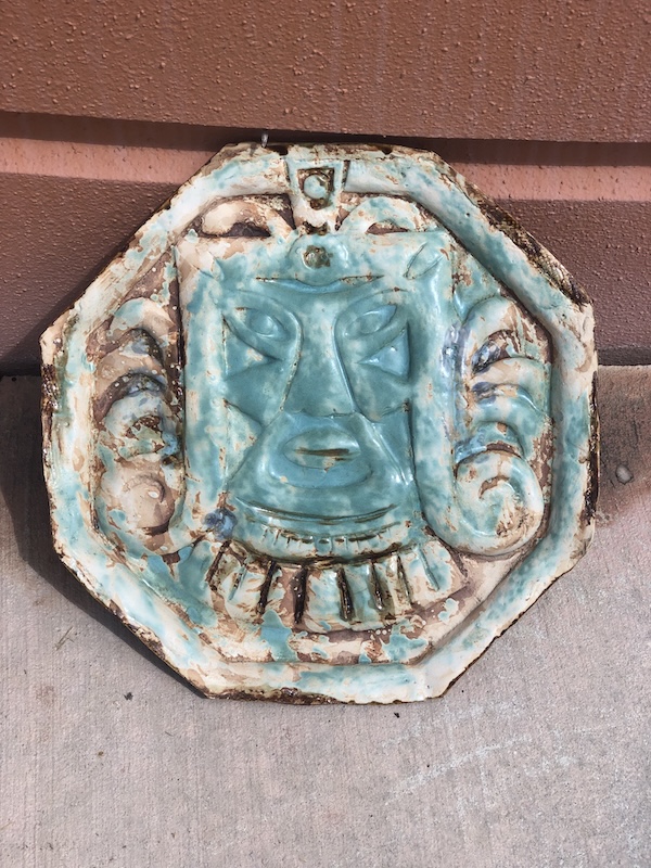 Plaque with Pre-columbian inspired face with green copper glaze