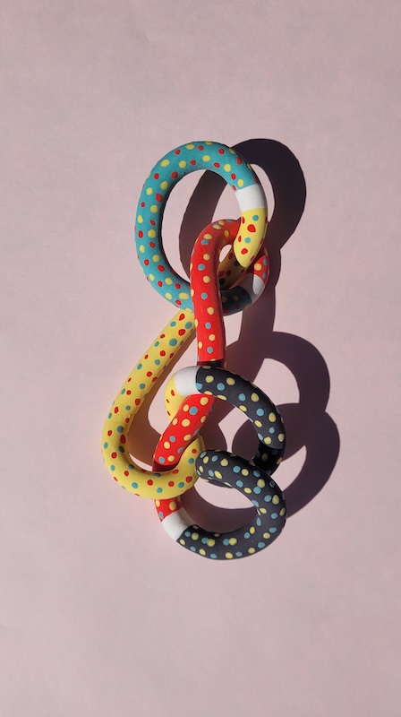 Colorful knot with dotted decorations